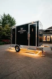 ADA-compliant portable restroom being cleaned by our local team in Arizona.